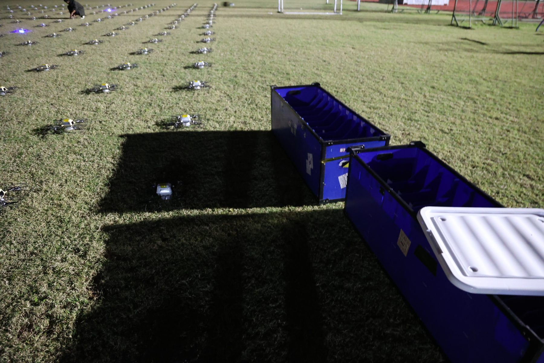 Flight cases and aircraft at a show site